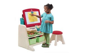 desk and easel combo with child
